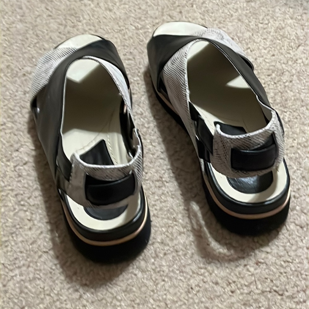 Black leather slides